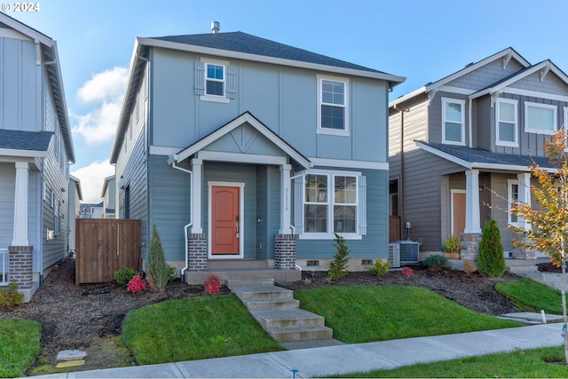 craftsman-style house featuring cooling unit