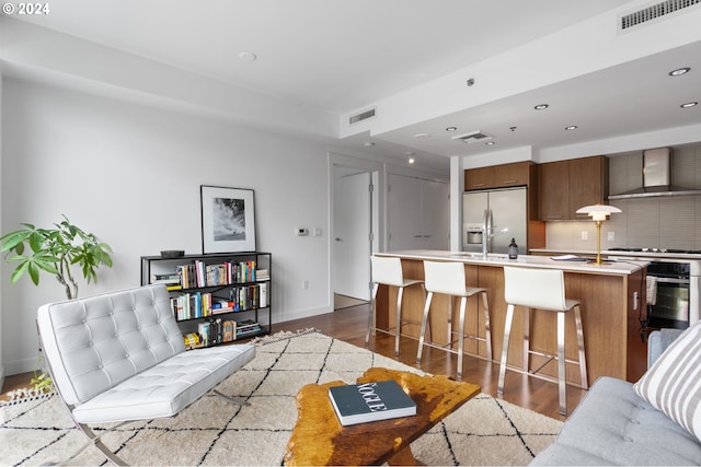 living room with dark hardwood / wood-style flooring