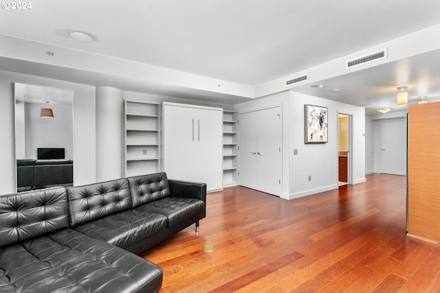 living room featuring wood-type flooring