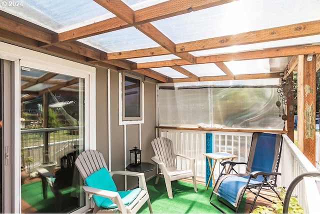 sunroom with beamed ceiling