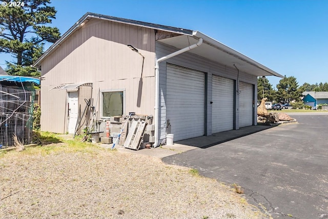 exterior space featuring a garage