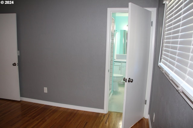 hallway featuring hardwood / wood-style flooring