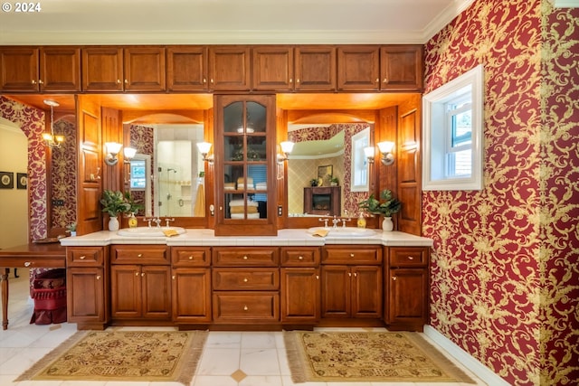 bathroom featuring vanity, a shower, and crown molding