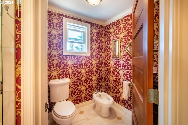 bathroom with tile patterned flooring, toilet, a bidet, and ornamental molding