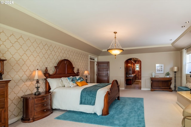 bedroom with carpet and crown molding