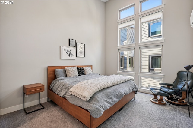 7926 SE 6th Ave Unit 4, Portland, OR 97202 - bedroom featuring carpet floors, a high ceiling, and baseboards