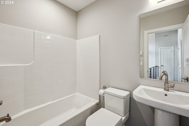 full bathroom with shower / bathing tub combination, toilet, and sink