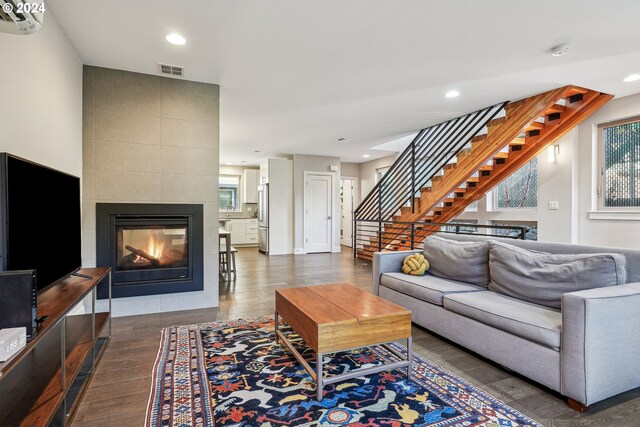 7926 SE 6th Ave Unit 4, Portland, OR 97202 - living area with dark wood-style floors, stairs, recessed lighting, and a fireplace