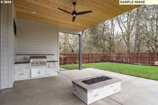 view of patio / terrace with a grill, ceiling fan, exterior kitchen, and an outdoor fire pit