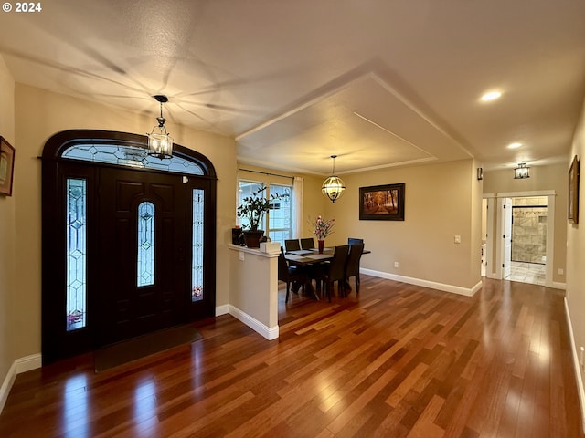 entryway with wood-type flooring