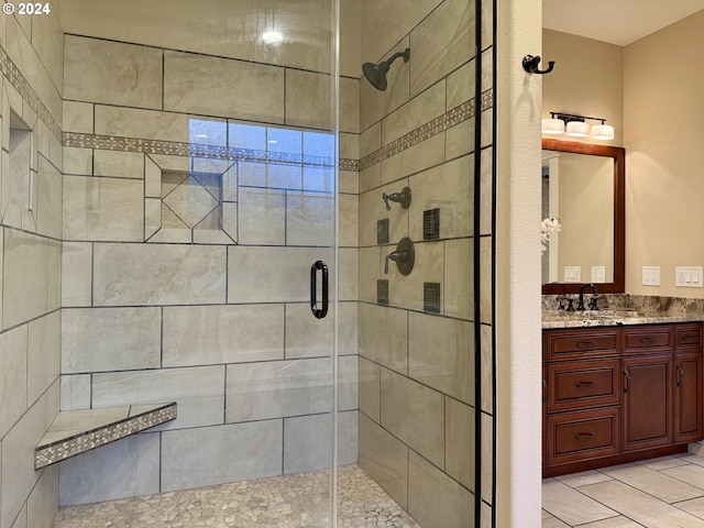 bathroom featuring vanity and walk in shower