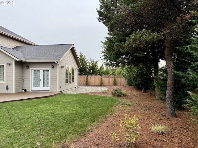 view of yard with french doors