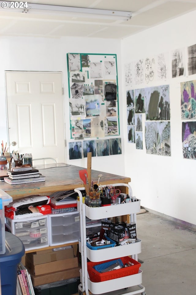 interior space featuring concrete flooring