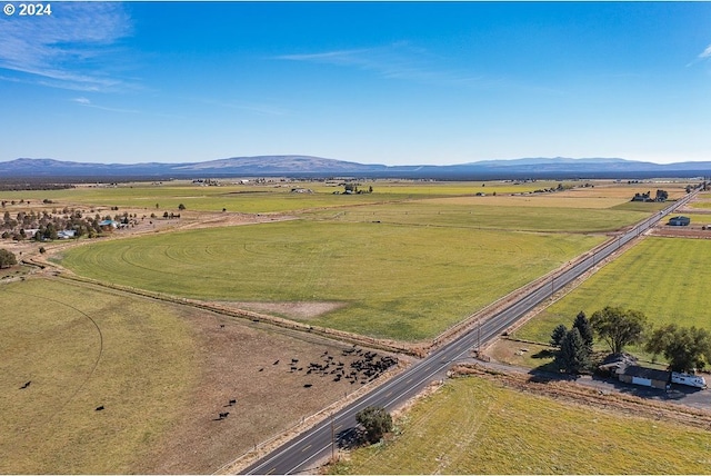 drone / aerial view with a rural view and a mountain view