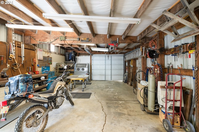 garage featuring a workshop area