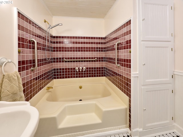 bathroom featuring bathtub / shower combination, tile walls, and ornamental molding