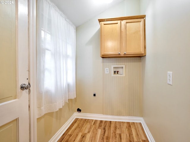 laundry area with electric dryer hookup, light hardwood / wood-style flooring, and washer hookup