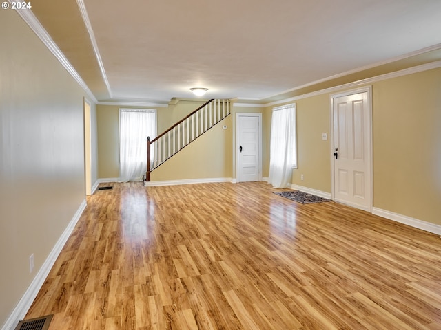 interior space with light hardwood / wood-style floors and a healthy amount of sunlight