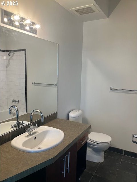 1410 SW 11th Ave Unit 402, Portland, OR 97201 - full bath featuring vanity and tile patterned flooring