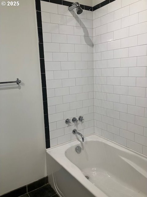 1410 SW 11th Ave Unit 402, Portland, OR 97201 - full bathroom with tub / shower combination and tile patterned floors