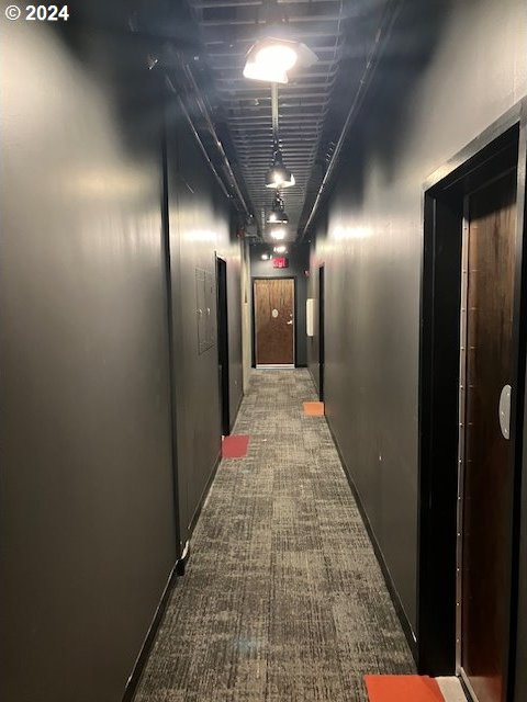 1410 SW 11th Ave Unit 402, Portland, OR 97201 - hallway featuring carpet floors and baseboards