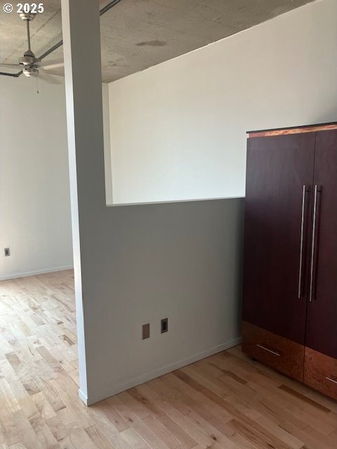 1410 SW 11th Ave Unit 402, Portland, OR 97201 - unfurnished room with light wood-type flooring and a ceiling fan