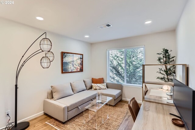 living room featuring light wood-type flooring