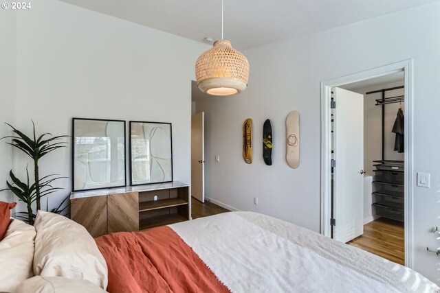 bedroom featuring hardwood / wood-style floors