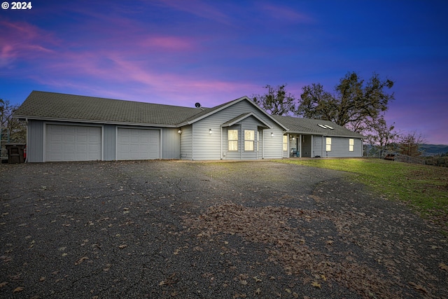 ranch-style home with a garage