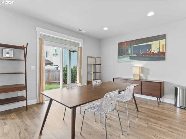 office area with light hardwood / wood-style floors