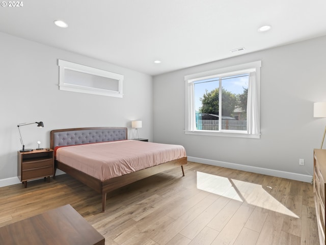 bedroom featuring hardwood / wood-style flooring