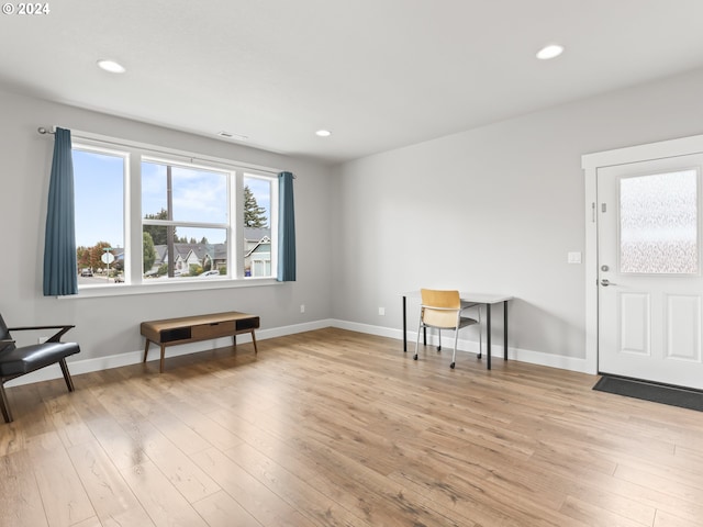 interior space with light hardwood / wood-style flooring