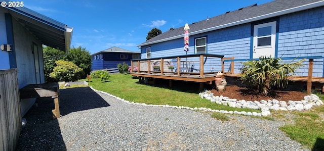 94142 4th St, Gold Beach, OR 97444 - view of green lawn with a wooden deck