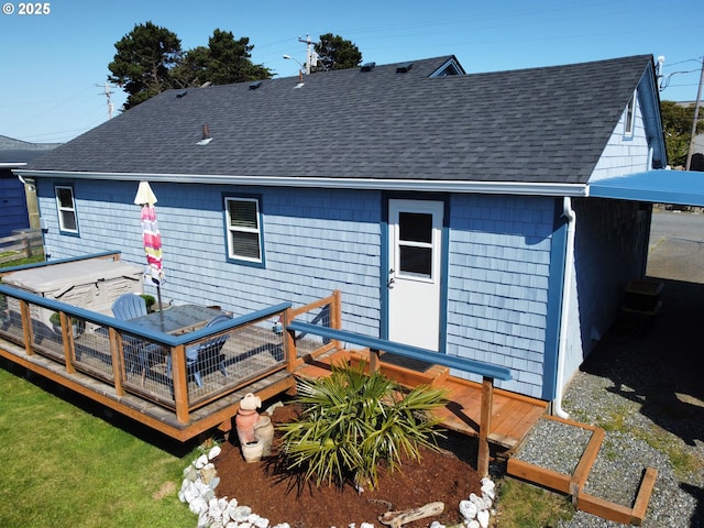 94142 4th St, Gold Beach, OR 97444 - rear view of property featuring a shingled roof and a wooden deck