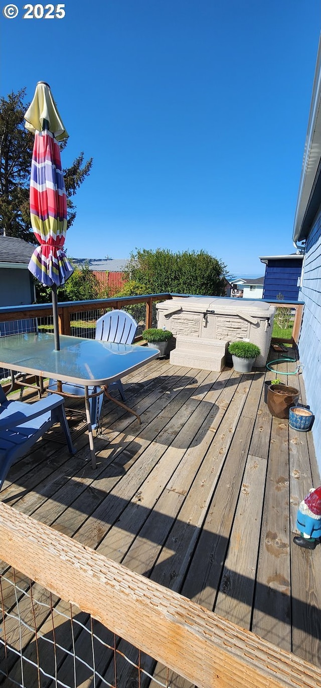 94142 4th St, Gold Beach, OR 97444 - wooden deck featuring outdoor dining area