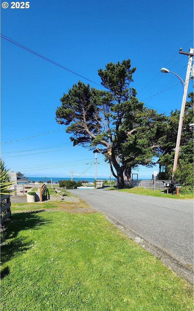 94142 4th St, Gold Beach, OR 97444 - view of asphalt road with street lighting