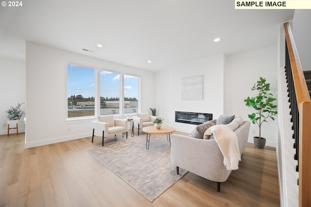 living room featuring light wood-type flooring