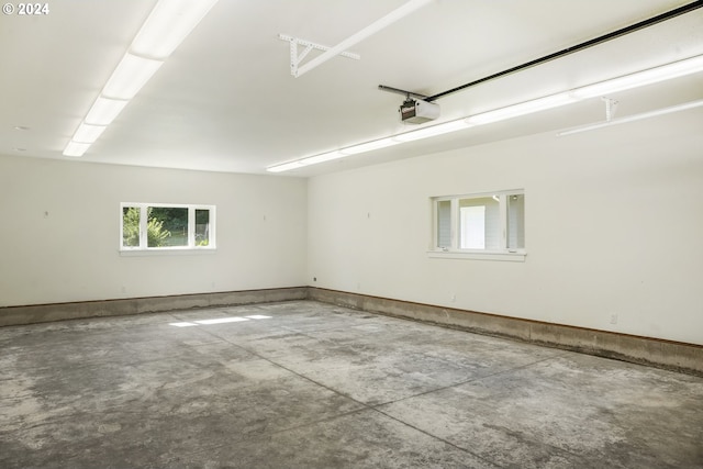 unfurnished room with concrete flooring