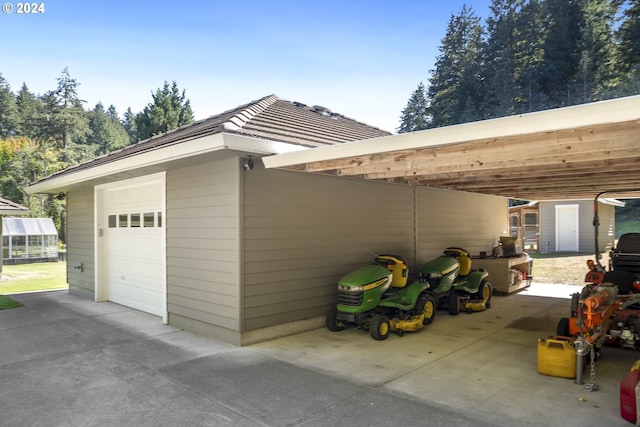 garage with a carport