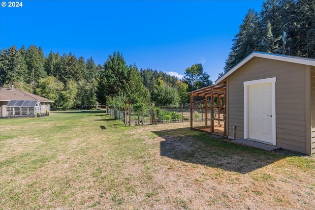 view of yard with a storage shed