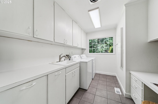2585 Dellwood Dr, Lake Oswego, OR 97034 - laundry room featuring visible vents, cabinet space, a sink, light tile patterned floors, and washer and clothes dryer