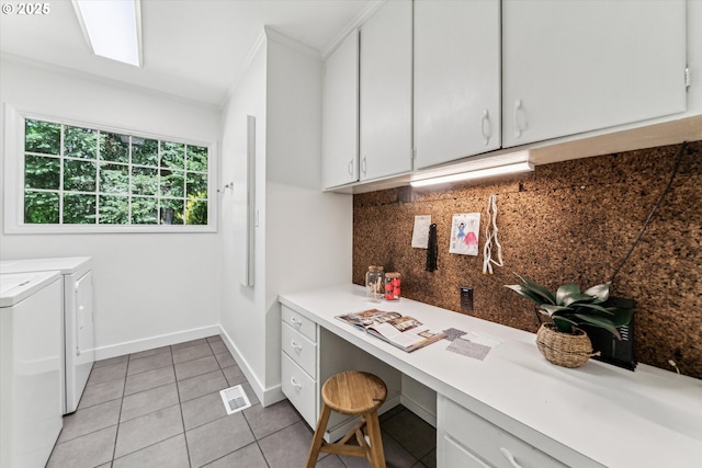2585 Dellwood Dr, Lake Oswego, OR 97034 - washroom with light tile patterned flooring, baseboards, visible vents, ornamental molding, and washer and clothes dryer