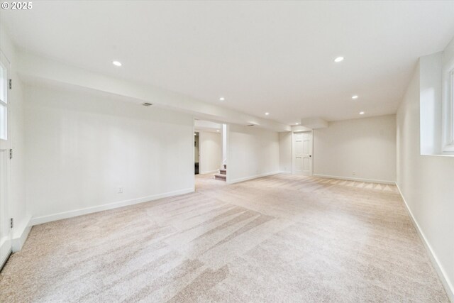 2585 Dellwood Dr, Lake Oswego, OR 97034 - finished below grade area with stairway, baseboards, recessed lighting, and light colored carpet