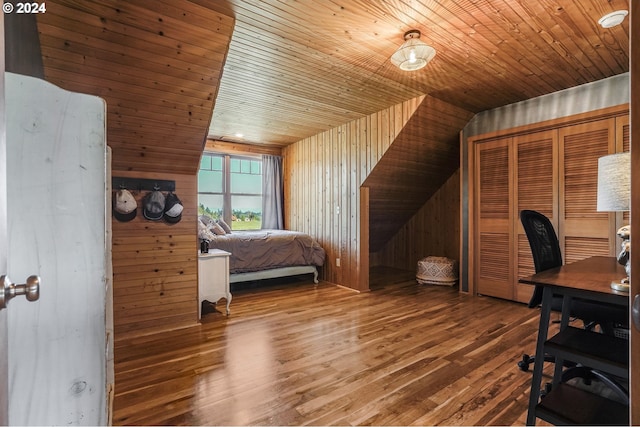 office area featuring wood walls, wood ceiling, vaulted ceiling, and wood-type flooring