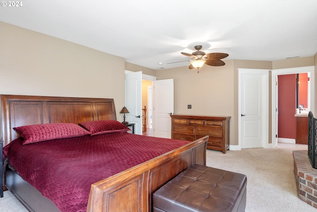 bedroom featuring ceiling fan and light colored carpet