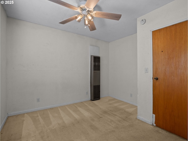 430 SE Elliott Ave, Gresham, OR 97080 - empty room featuring a ceiling fan, a heating unit, light carpet, and baseboards