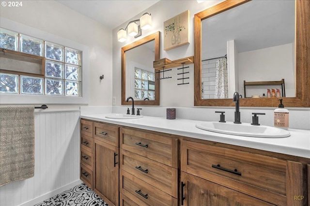 bathroom featuring tile patterned floors and vanity