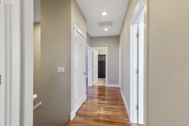 hall featuring hardwood / wood-style flooring