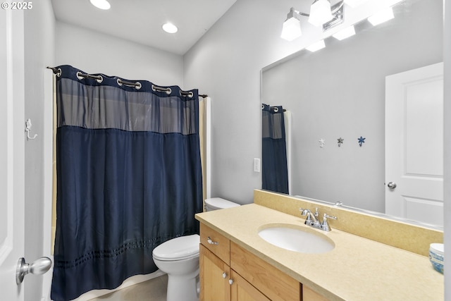 full bathroom with vanity, toilet, and a shower with curtain