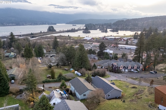 drone / aerial view with a water view